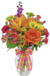 Happy Day Bouquet combines konfetti roses, fuschia stock, orange lilies, yellow daisies, hot pink carnations and other flowers for an all around brightly colored bouquet that is ideal for any occasion.