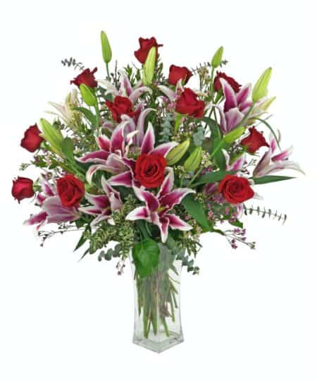 a magnificent combination of red Roses and Stargazer Lilies. If the fragrance of the lilies doesn't attract enough attention, this beautiful combination of flowers certainly will. 